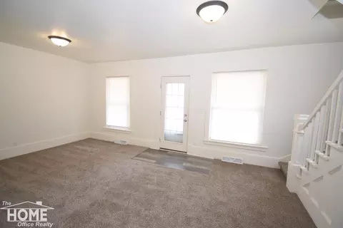 Living - 321 E Stewart, Owosso, MI 48867 photo 2 of 3