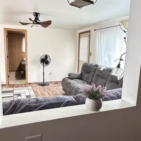 Living - 6354 Swallow, Harrison, MI 48625 photo 2 of 2