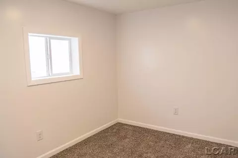 Bedroom - 1015 E Hunt, Adrian, MI 49221 photo 2 of 8