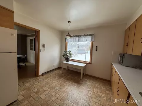 Kitchen - 1016 S 10th, Escanaba, MI 49829 photo 2 of 3