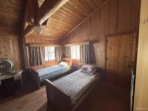 Bedroom - 18919 W Needle Pointe, Germfask, MI 49836 photo 6 of 9