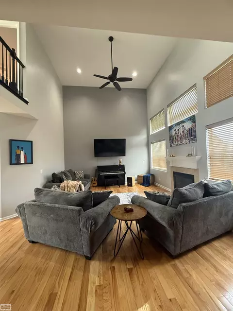 Living - 46514 Chalmers Dr, Macomb, MI 48044 photo 2 of 2
