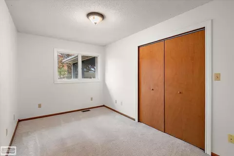 Bedroom - 9800 Coon Hill Rd, Munith, MI 49259 photo 3 of 6