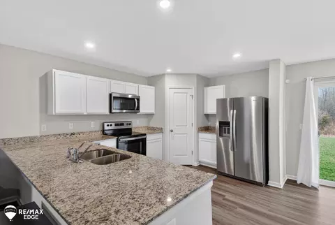 Kitchen - 7311 Red Maple, Mount Morris, MI 48458 photo 2 of 3