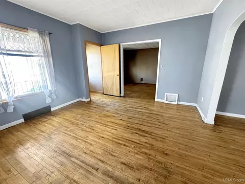 Living - 309 S 18th, Escanaba, MI 49829 photo 2 of 3