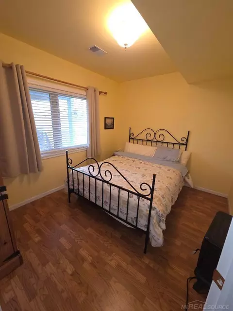 Bedroom - 5700 Royal Ct, Butman, MI 48624 photo 5 of 5