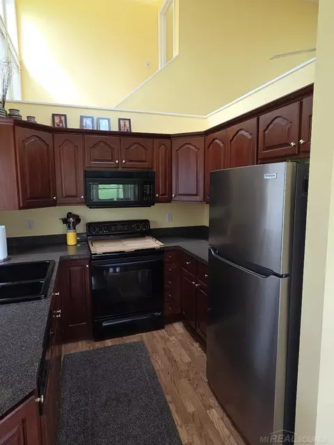 Kitchen - 5700 Royal Ct, Butman, MI 48624 photo 2 of 3