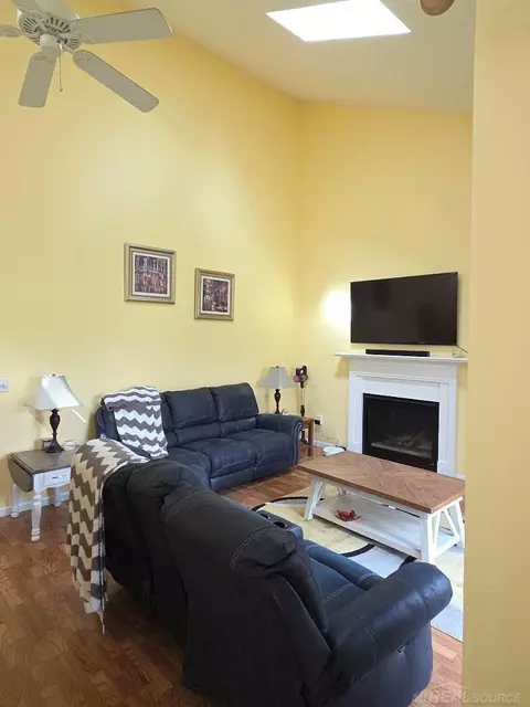 Living - 5700 Royal Ct, Butman, MI 48624 photo 2 of 3