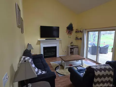 Living - 5700 Royal Ct, Butman, MI 48624 photo 1 of 3