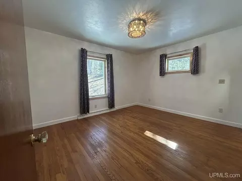 Bedroom - e9506 Prospect Street, Munising, MI 49862 photo 4 of 5