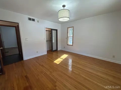 Bedroom - e9506 Prospect Street, Munising, MI 49862 photo 3 of 5