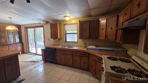 Kitchen - 7122 Maple Grv, Munising, MI 49862 photo 2 of 2