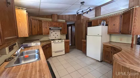 Kitchen - 7122 Maple Grv, Munising, MI 49862 photo 1 of 2