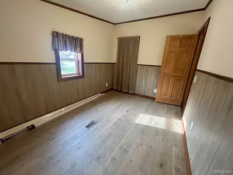 Bedroom - e9574 Prospect Street, Munising, MI 49862 photo 5 of 5