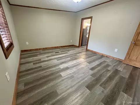 Bedroom - e9574 Prospect Street, Munising, MI 49862 photo 1 of 5