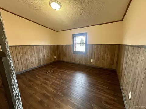 Bedroom - e9574 Prospect Street, Munising, MI 49862 photo 2 of 5