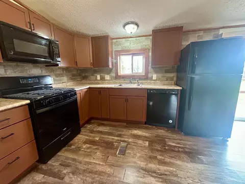 Kitchen - e9574 Prospect Street, Munising, MI 49862 photo 2 of 3