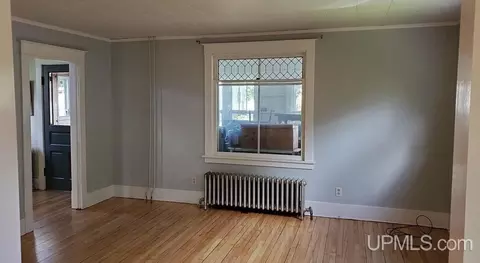 Living - 1313 N Third, Ishpeming, MI 49849 photo 1 of 2