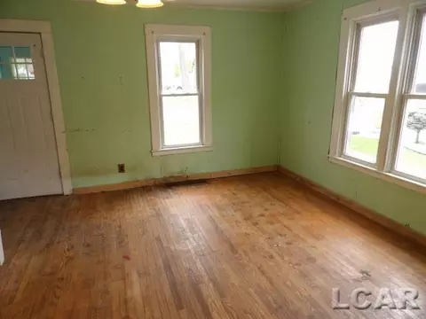 Living - 1138 E Hunt, Adrian, MI 49221 photo 1 of 2