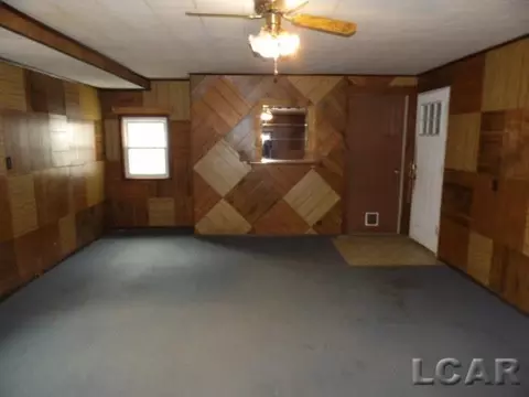Living - 1138 E Hunt, Adrian, MI 49221 photo 2 of 2