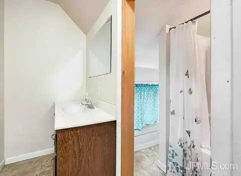 Bath - 211 N 16th, Escanaba, MI 49829 photo 1 of 2