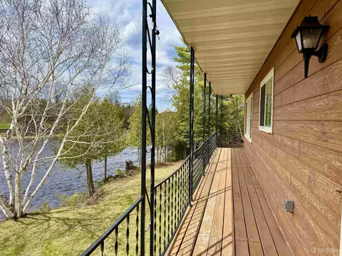 Exterior - 10813 S S Riv, Cornell, MI 49818 photo 4 of 9