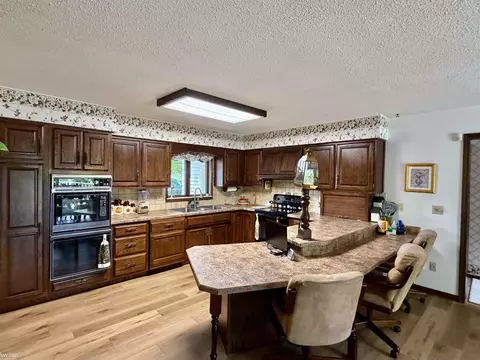 Kitchen - 7432 River, Flushing, MI 48433 photo 2 of 7