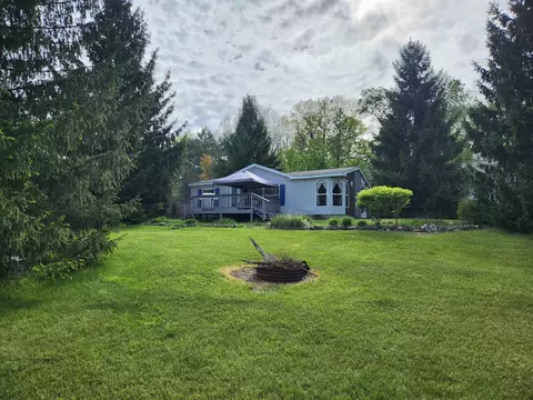 Exterior - 917 Chappel Dm, Gladwin, MI 48624 photo 2 of 10