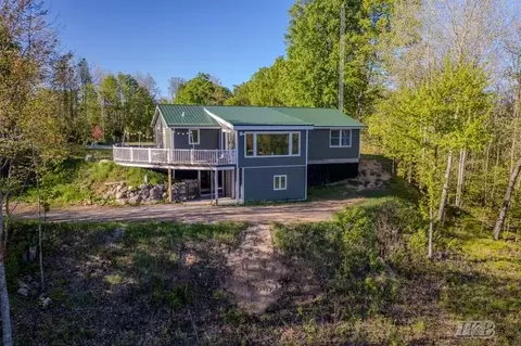 Exterior - 8818 Arnold Lk, Harrison, MI 48625 photo 4 of 6