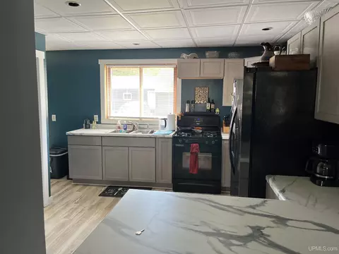 Kitchen - 702 Wabash, Ishpeming, MI 49849 photo 1 of 6