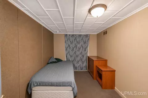Bedroom - 115 Chestnut, Munising, MI 49862 photo 1 of 3