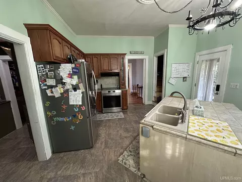 Kitchen - 115 Oak St, Ishpeming, MI 49849 photo 2 of 2