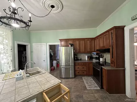 Kitchen - 115 Oak St, Ishpeming, MI 49849 photo 1 of 2