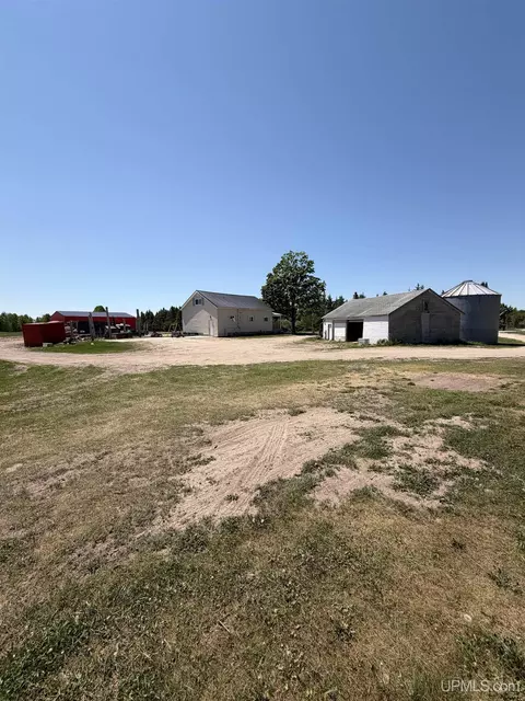 Exterior - 6980 E Ln, Bark River, MI 49807 photo 7 of 16