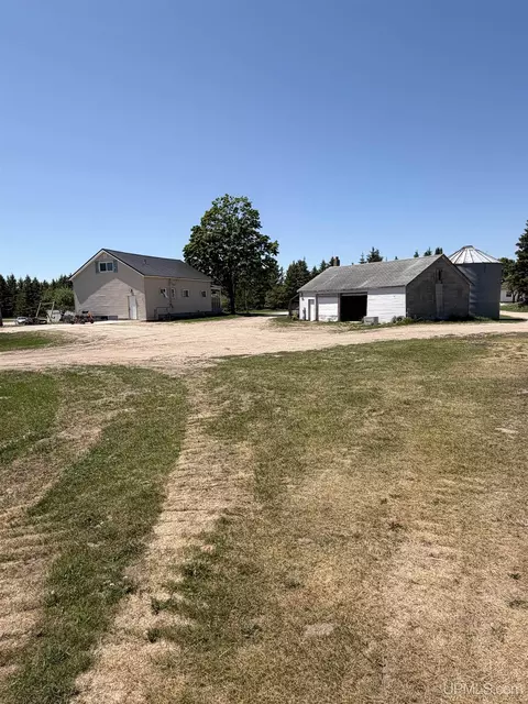 Exterior - 6980 E Ln, Bark River, MI 49807 photo 3 of 16