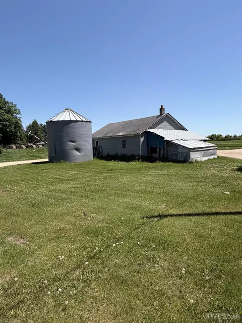 Exterior - 6980 E Ln, Bark River, MI 49807 photo 8 of 16