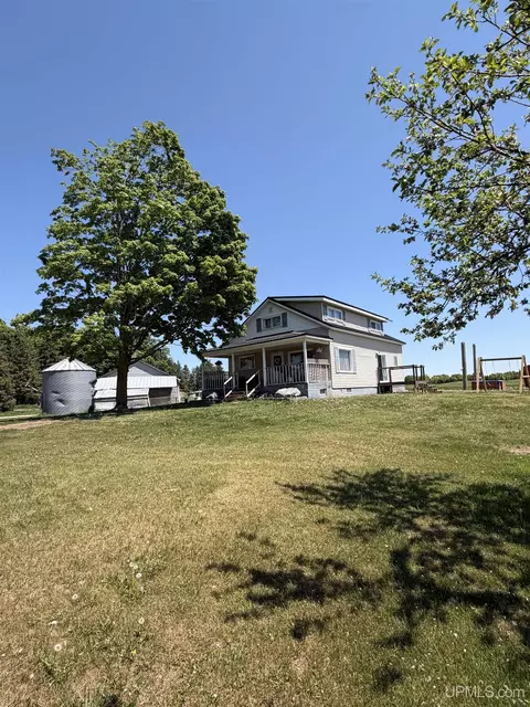Exterior - 6980 E Ln, Bark River, MI 49807 photo 12 of 16