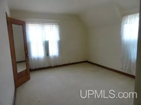 Bedroom - 130 E Onota, Munising, MI 49862 photo 2 of 2