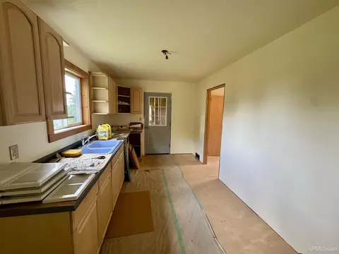 Kitchen - 417 3rd, Alpha, MI 49902 photo 2 of 2