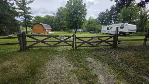 6591 S Tripp, Osseo, MI 49266