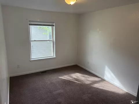 Bedroom - 710 E Fourth, Monroe, MI 48161 photo 6 of 7