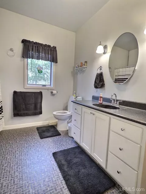 Bath - 5877 Five Mile Pt, Allouez, MI 49805 photo 1 of 4