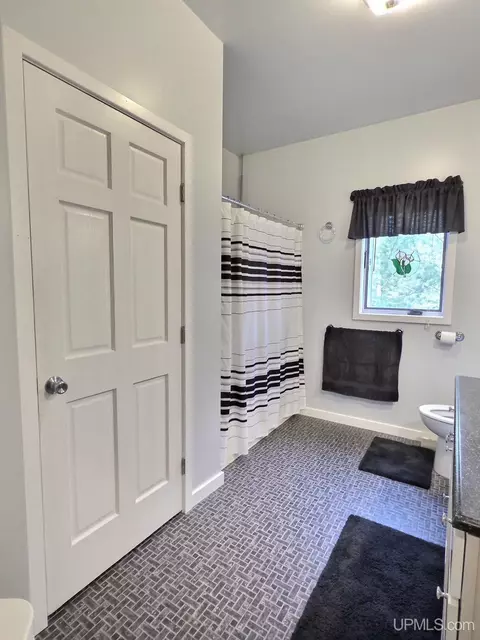 Bath - 5877 Five Mile Pt, Allouez, MI 49805 photo 2 of 4
