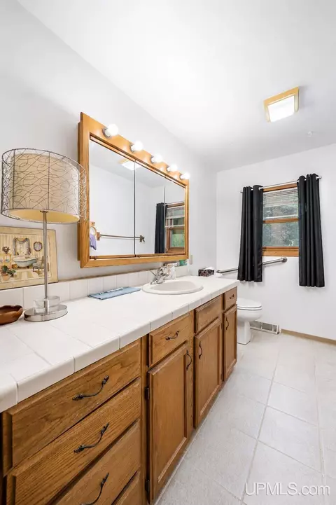 Bath - n8766 Peter White Road, Deerton, MI 49822 photo 1 of 2