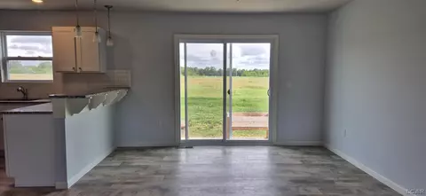 Living - 3284 Sutton, Adrian, MI 49221 photo 1 of 2