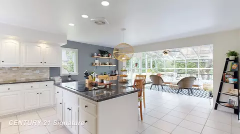 Kitchen - 7492 River, Flushing, MI 48433 photo 3 of 5