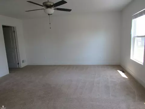 Living - 59203 E Brockton St, New Haven, MI 48048 photo 3 of 4