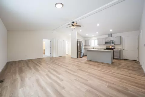 Living - 1208 Pheasant Run, Gladwin, MI 48624 photo 4 of 7