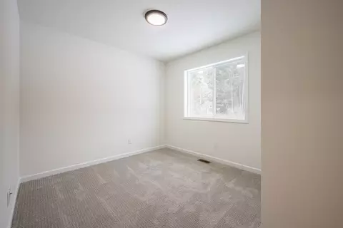 Bedroom - 1208 Pheasant Run, Gladwin, MI 48624 photo 7 of 10