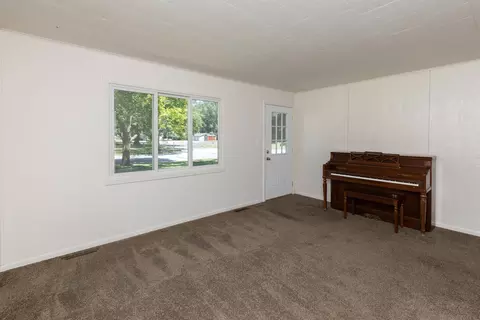 Living - 1002 E Sugnet, Midland, MI 48642 photo 1 of 2